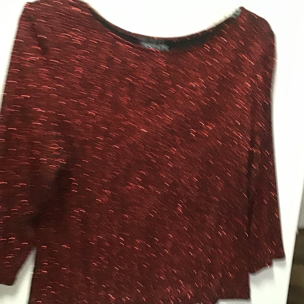 Red glitter top black background
